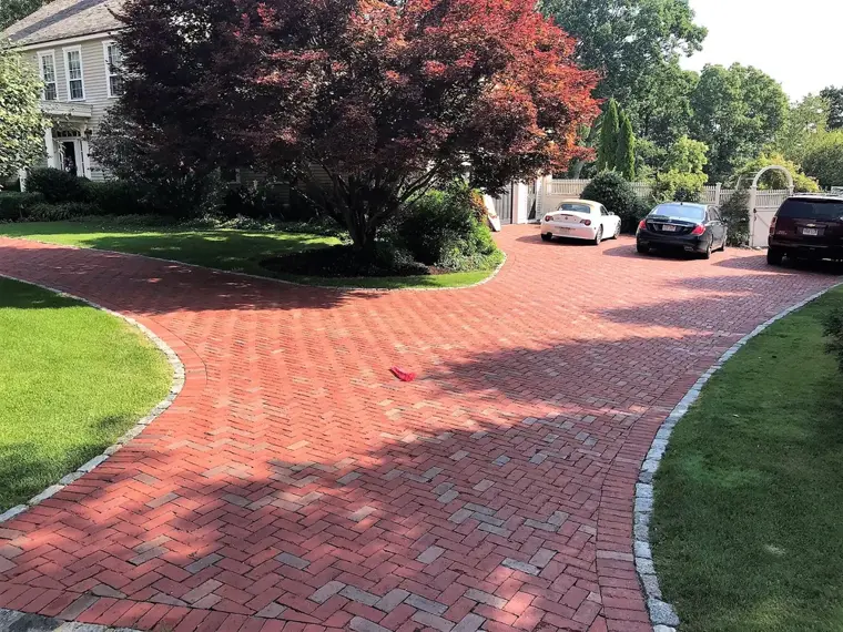 Curved brick paver driveway