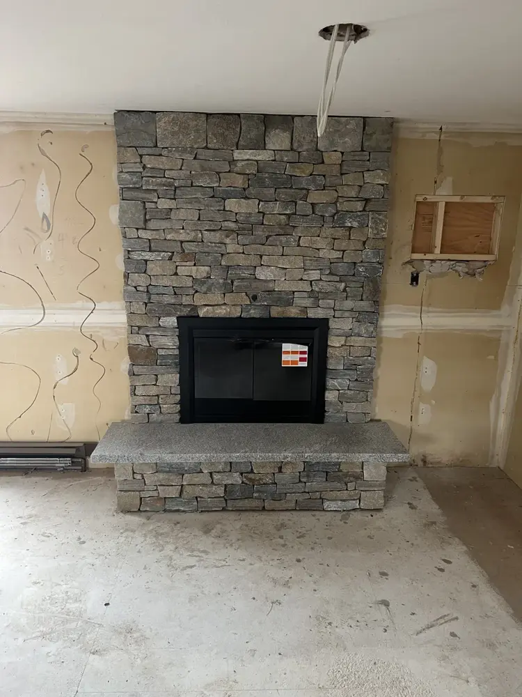 Stone fireplace under construction