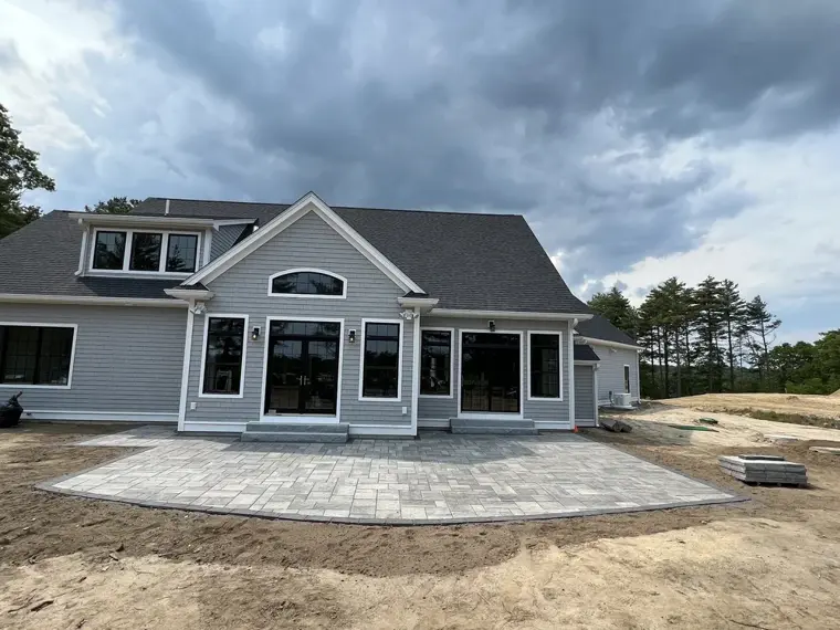 Paver patio behind a new home
